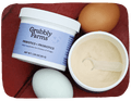 Grubbly Farms prebiotics and probiotics product with eggs on a red background